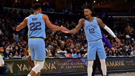 ja morant photos|Ja Morant hypes up Grizzlies crowd as fan